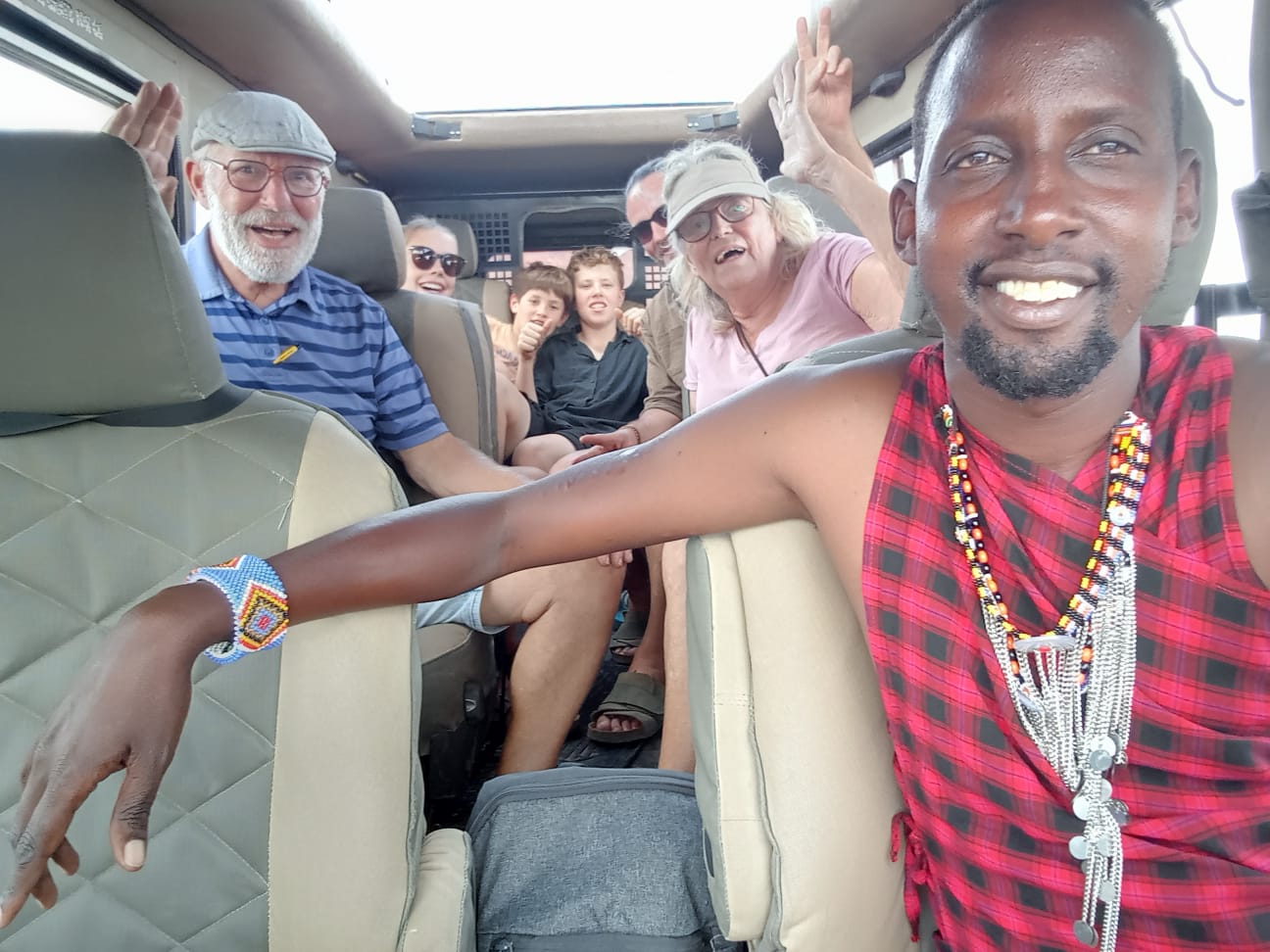 Elephant family walking with Mount Kilimanjaro in background at Amboseli